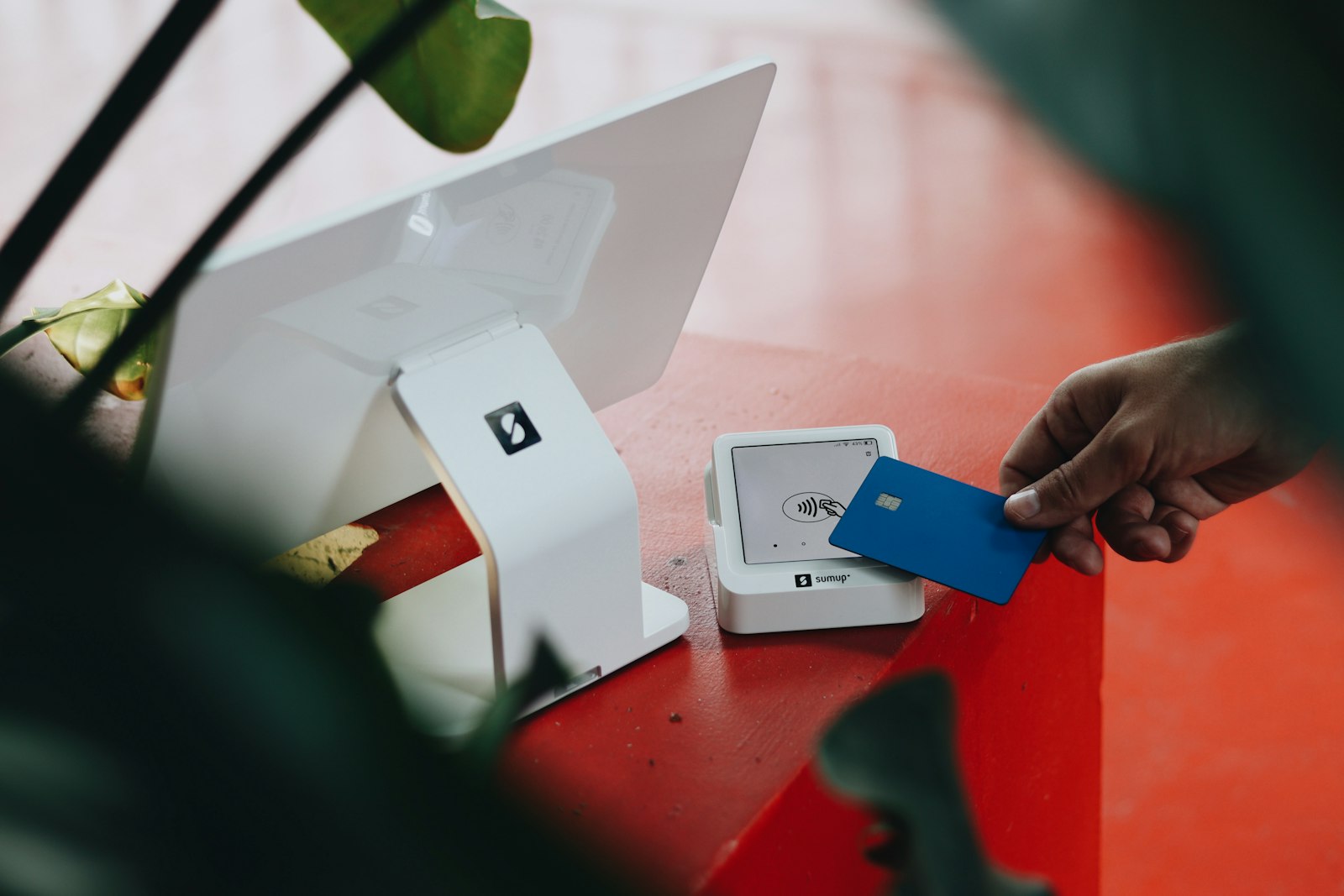Retail point-of-sale terminal, representing the in-store redemption flow
